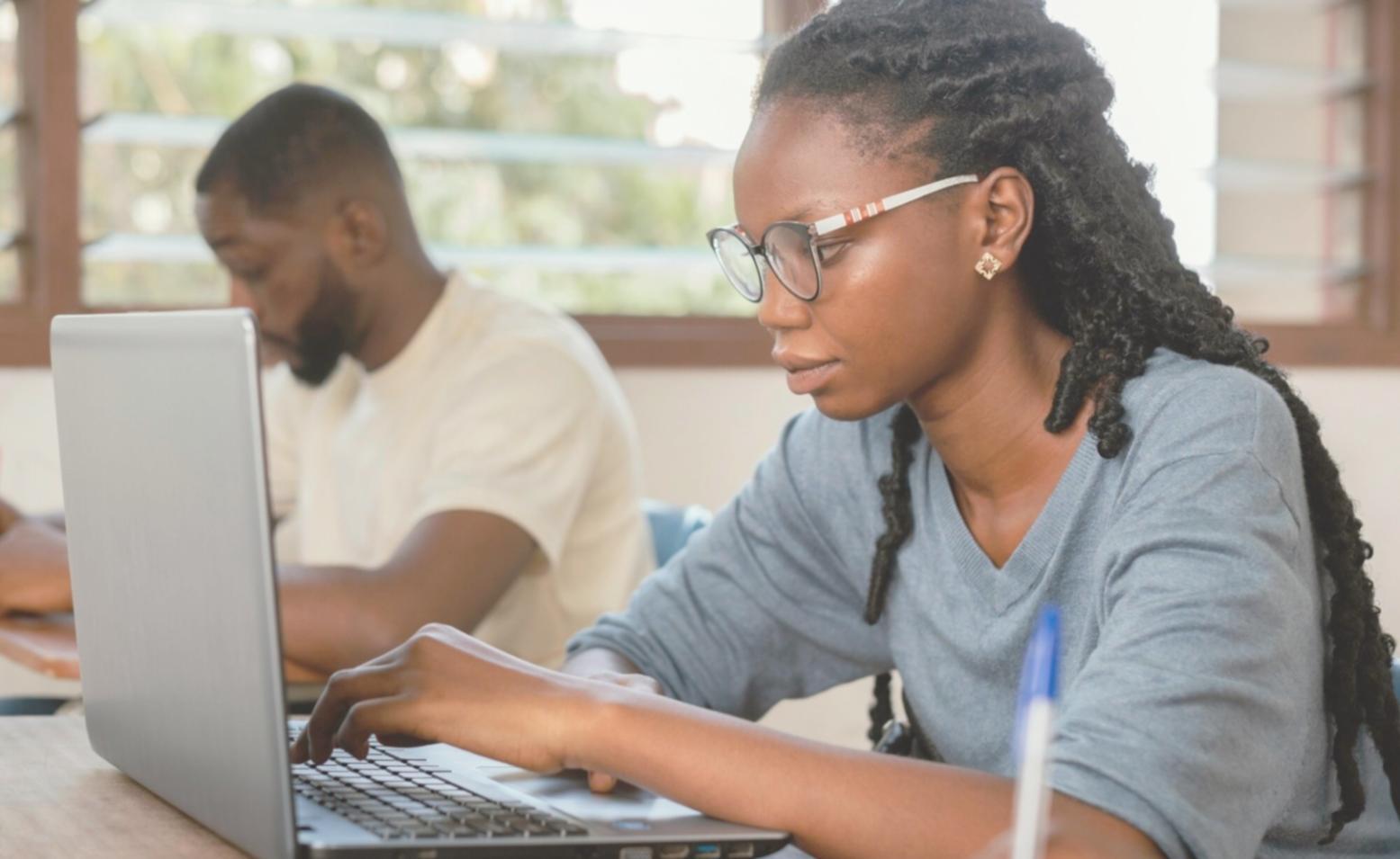 Business analysis classroom setting with detailed financial training materials